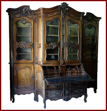 Exceptionnelle commode scribanne biblioth&egrave;que en acajou massif moulur&eacute; et richement sculpt&eacute; La Rochelle XVIIIe